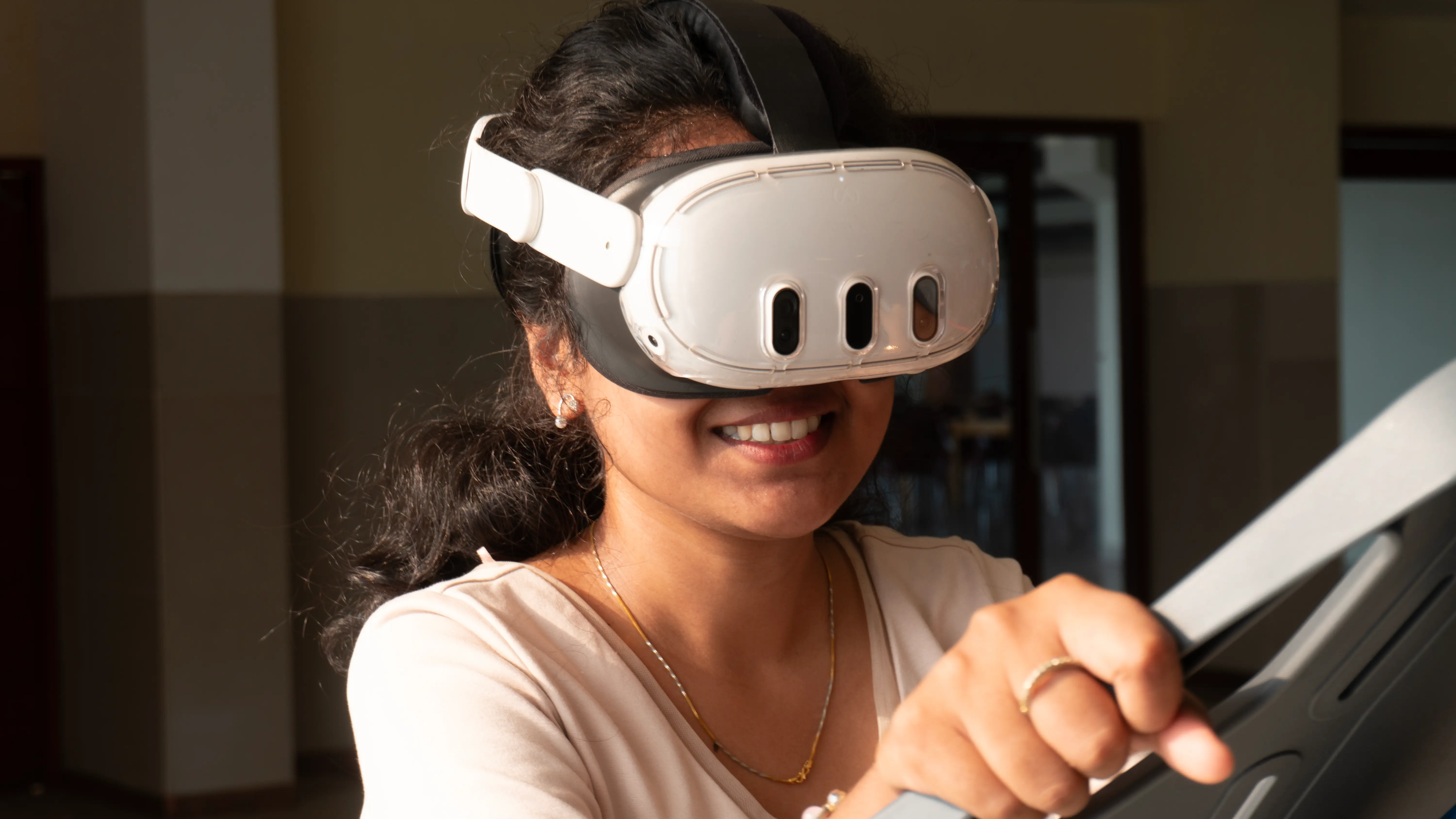 Real event guest smiling with VR headset on the SkyDrop VR Bungee