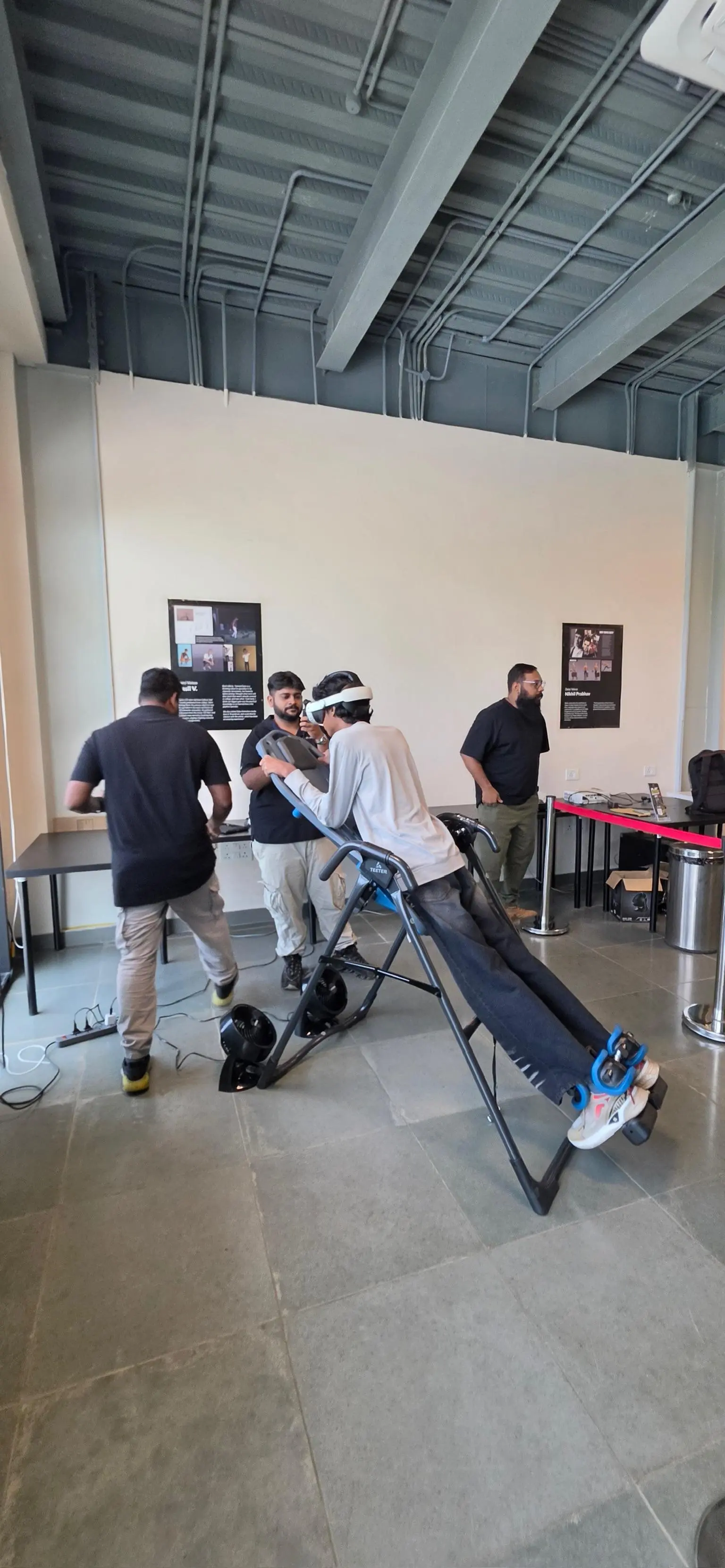 Real event guest riding the SkyDrop VR Bungee inversion rig